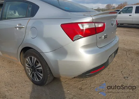 2013 Kia Rio Lx z USA, uszkodzony, nr VIN KNADM4A31D6172916